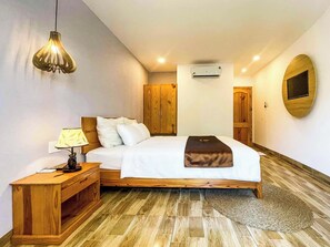Deluxe Double Room, Garden View | Down comforters, pillowtop beds, minibar, in-room safe - BB Hotel & Resort (Phu Quoc)