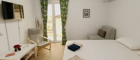 Habitación Deluxe | Colchones con acolchado adicional y decoración individual