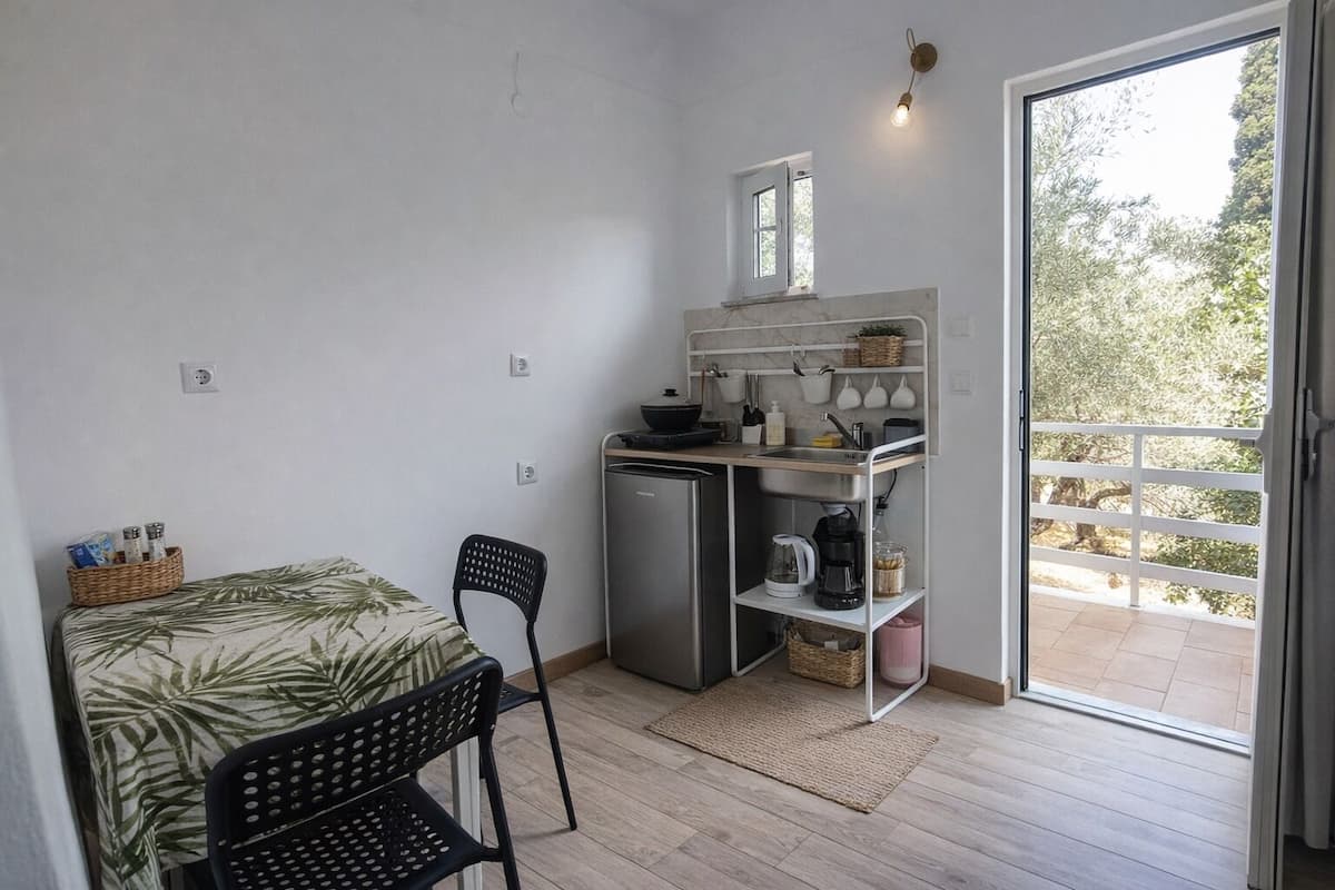 Appartement Confort, climatisation, vue montagne | Cuisine privée | Réfrigérateur, machine à expresso, cafetiÚre/bouilloire