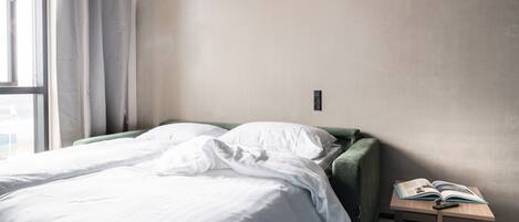 1 slaapkamer, een strijkplank/strijkijzer, wifi, beddengoed