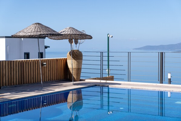 Outdoor pool, pool umbrellas, pool loungers