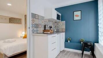 1 slaapkamer, een strijkplank/strijkijzer, wifi, beddengoed