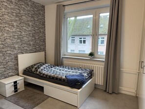 2 dormitorios, tabla de planchar con plancha, wifi gratis y ropa de cama