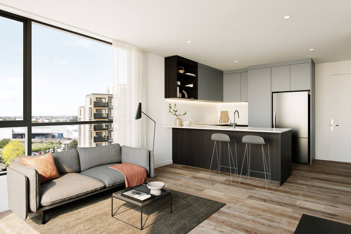 A modern apartment with a living area, kitchen, and large windows offering a city view.