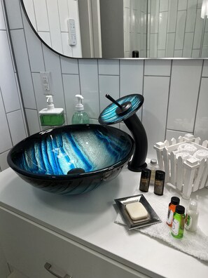 Hair dryer, bidet, towels, soap