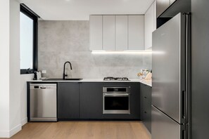 Private kitchen - Fitzroy North Apartments by Urban Rest (Clifton Hill)