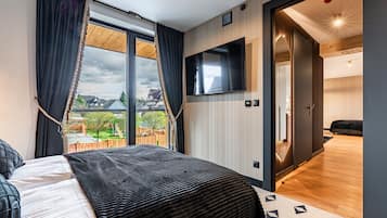 1 habitaciĂłn y minibar con artĂculos gratuitos
