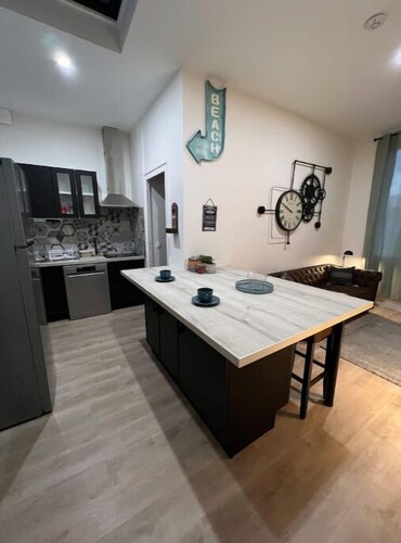 Chambre avec salon et cuisine commune