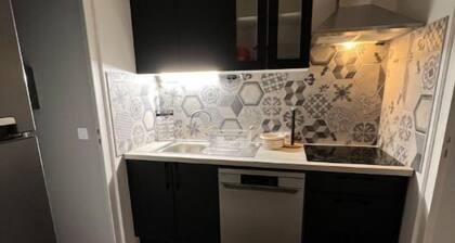 Chambre avec salon et cuisine commune