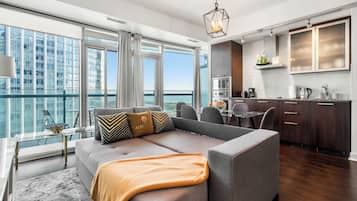 Superior Apartment, Multiple Beds, Balcony, Lake View | Living area | 43-inch flat-screen TV with satellite channels, Netflix, Hulu