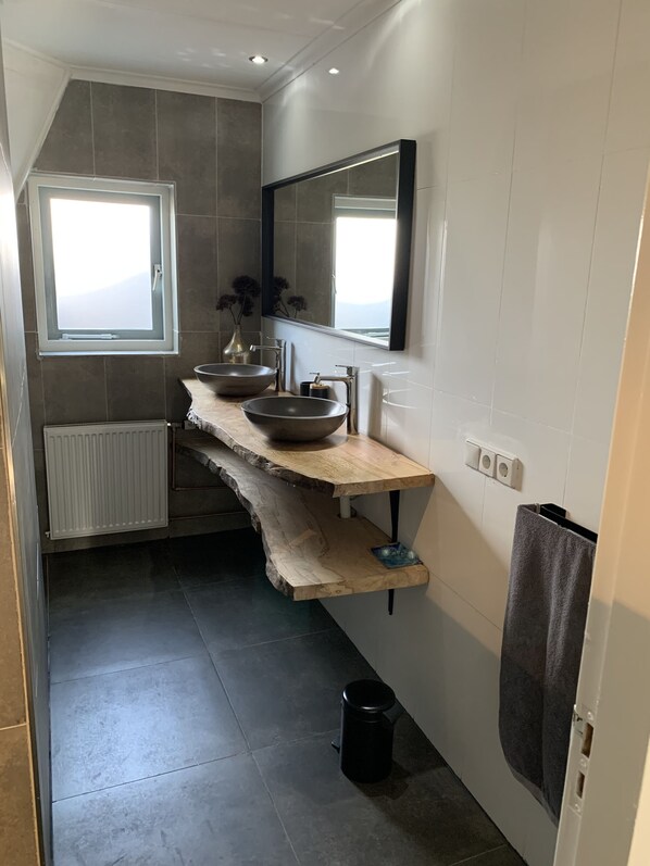 Shower, towels, toilet paper