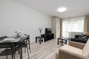 Apartment, 1 Schlafzimmer, Balkon, Meerseite | Wohnzimmer