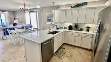 Coffee/tea maker, fridge, microwave, oven