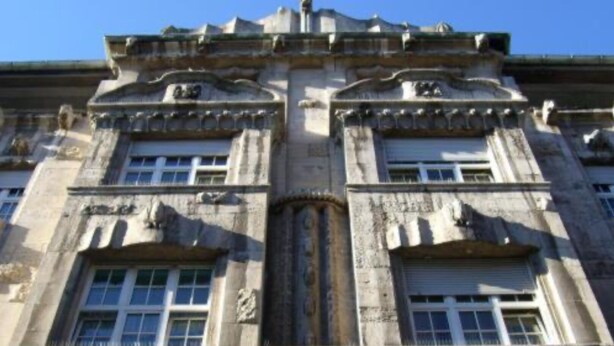 A historic building with classical architecture, featuring ornate carvings and a symmetrical facade. - Hotel Continental (Nuremberg)