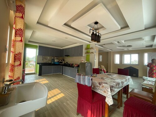 Home is located on the side of a mountain near a famous Buddhist monastery.  
