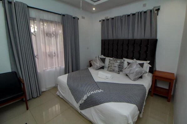 Standard Room, Balcony, Garden View | 1 bedroom, individually decorated, desk, laptop workspace