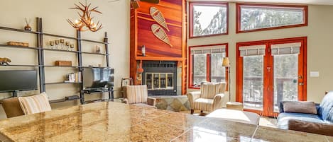 TV, fireplace, books