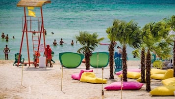 Private beach, white sand, sun-loungers, beach umbrellas