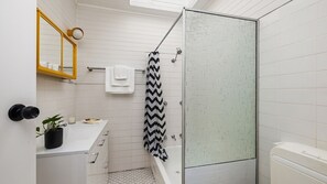 Shower, hair dryer, towels