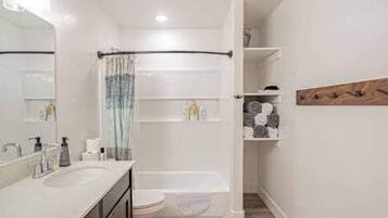 Hair dryer, towels, soap, shampoo