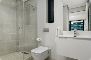 Shower, hair dryer, towels, soap