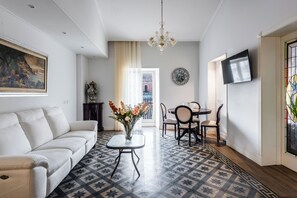 Panoramic Apartment | Living area | 35-inch TV with digital channels - La Perla del Duomo by Wonderful Italy (Catania)