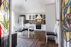 Panoramic Apartment | Private kitchen | Full-size fridge, oven, stovetop, coffee/tea maker