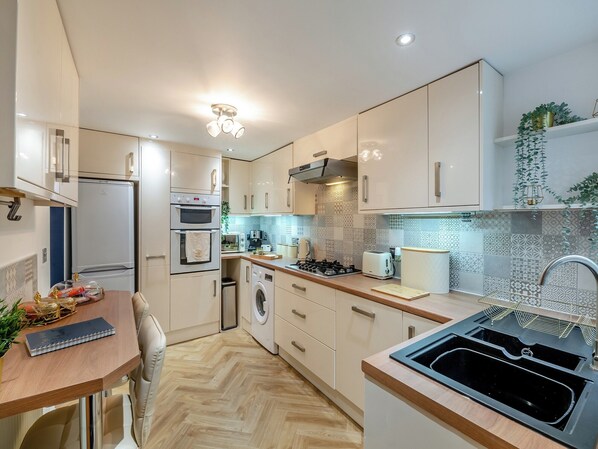 Dishwasher, high chair, cookware/dishes/utensils