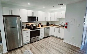 Fridge, microwave, oven, stovetop - Walk to Everything From The Lofts Suite 202 (West Palm Beach)