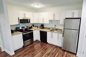 Fridge, microwave, oven, stovetop - Walk to Everything From The Lofts Suite 206 (West Palm Beach)