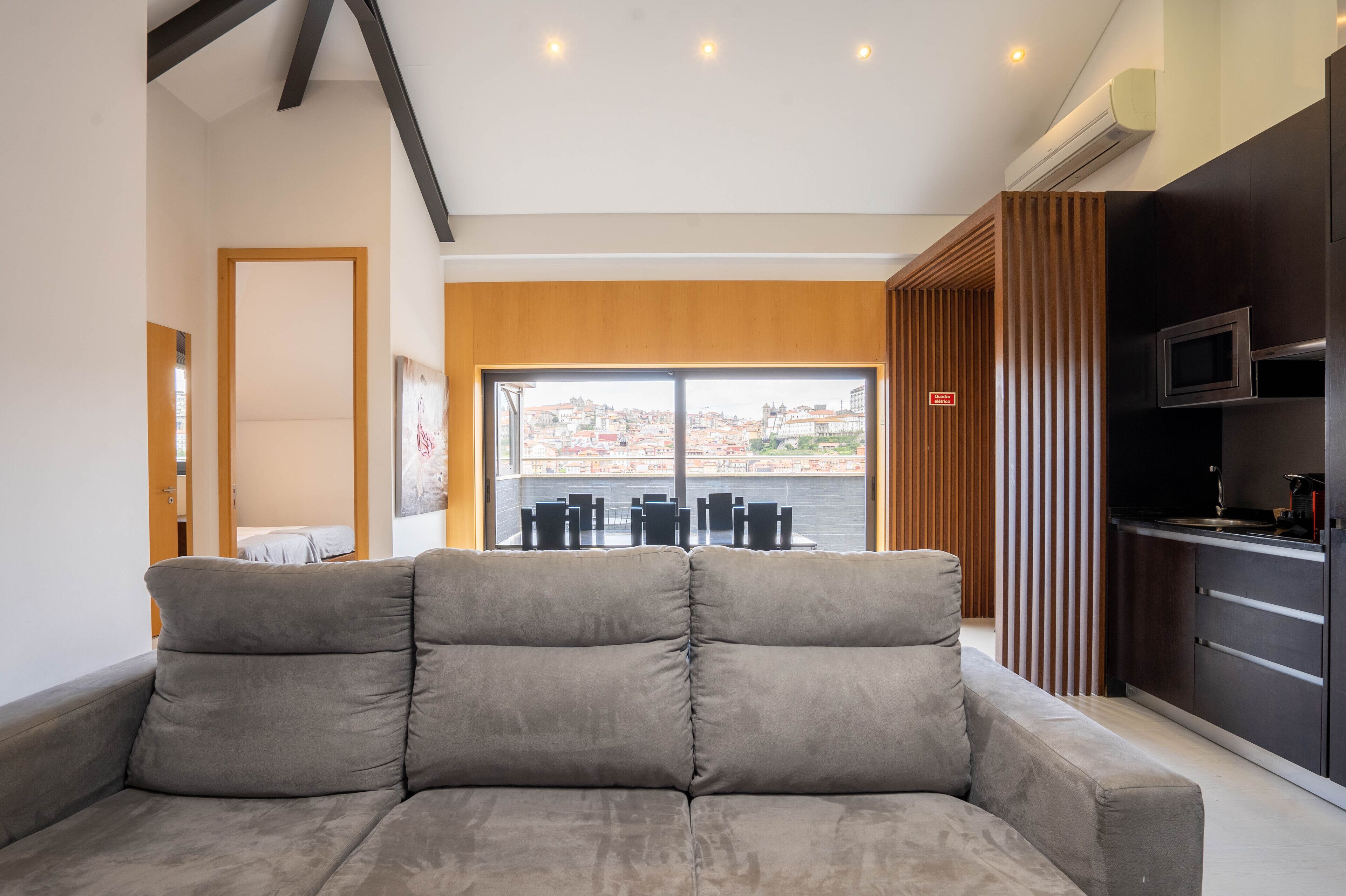 Panoramic Apartment | Living area | Flat-screen TV