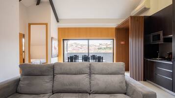 Panoramic Apartment | Living area | Flat-screen TV
