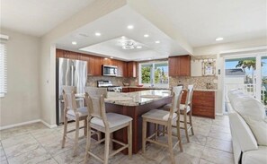 Fridge, microwave, oven, stovetop - Redfish Retreat - South End Pool Home (Fort Myers Beach)