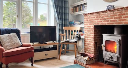 River View sits beside the River Bradford with views of the hills and river.