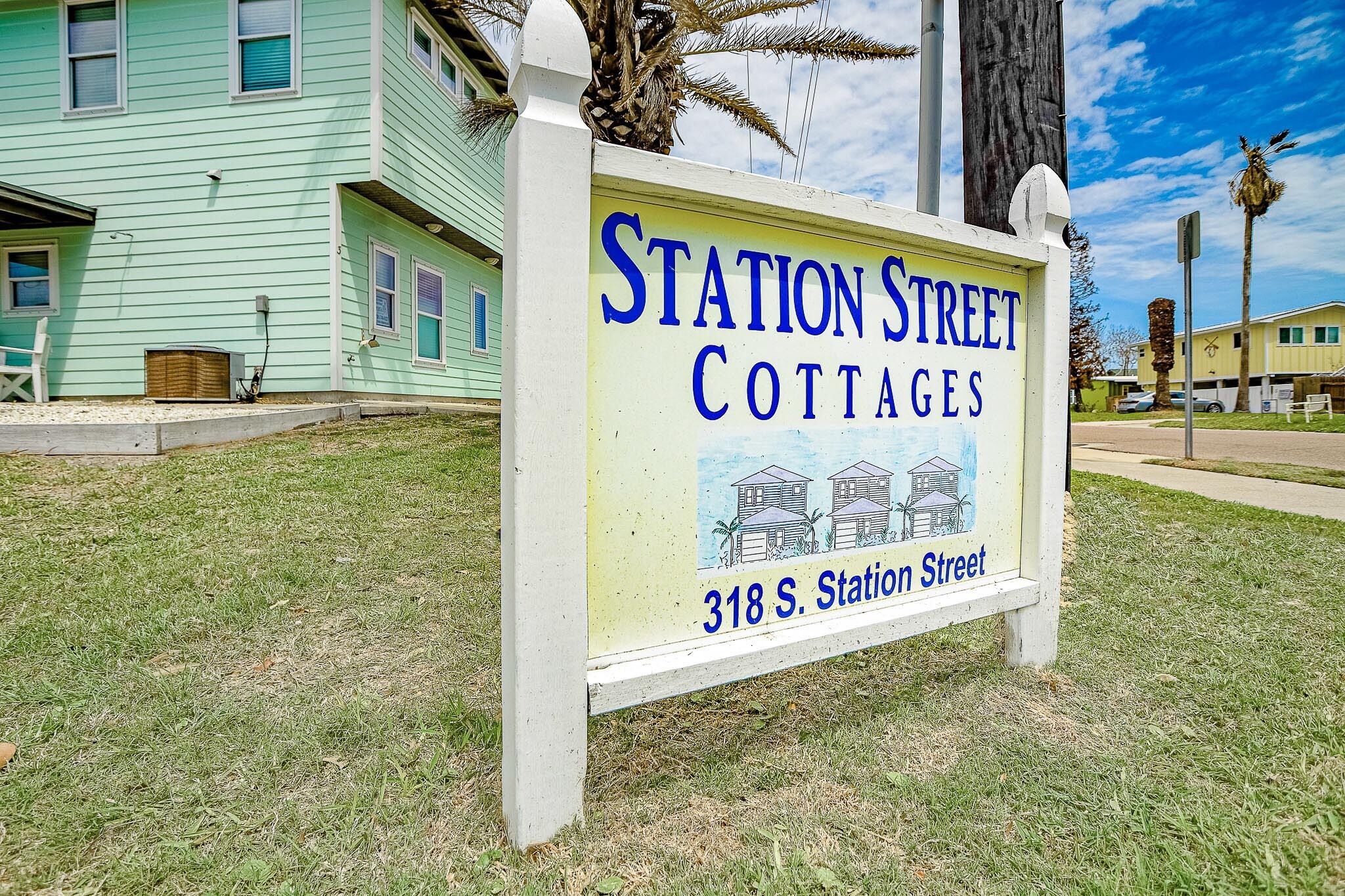 A sign for Station Street Cottages at 318 S. Station Street.
