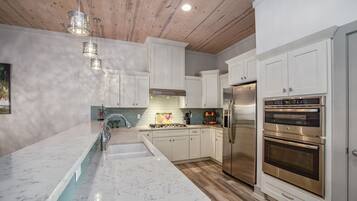 Condo, Multiple Beds, Patio (Marina Del Bell) | Private kitchen | Dining tables