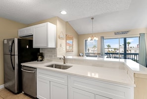 Condo, Multiple Beds, Hot Tub (Spinnaker 317) | Private kitchen | Coffee/tea maker, dining tables