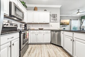 Appart'hôtel, plusieurs lits, patio, vue jardin (Pathway to the Sea 108 ) | Cuisine privée