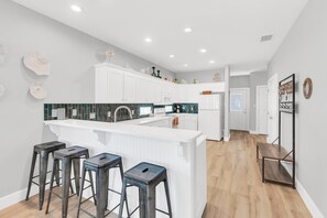 House, Multiple Beds, Patio, Beach View (Coconut Hut ) | Private kitchen | Coffee/tea maker, dining tables - Coconut Hut - Pet Friendly! Boardwalk to the Beach! - Pet Friendly! Boardwalk to the Beach! (Port Aransas)