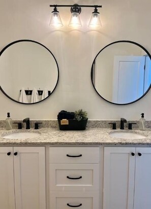 Hair dryer, towels, soap, shampoo