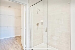 Shower, eco-friendly toiletries, hair dryer, towels