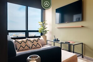 Comfort Apartment, 1 King Bed with Sofa bed | Living room | 55-inch Smart TV with digital channels, Netflix, streaming services - BeGrand Reforma by Naya Homes (Mexico City)