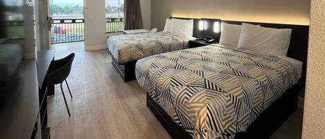 Desk, laptop workspace, free WiFi, bed sheets