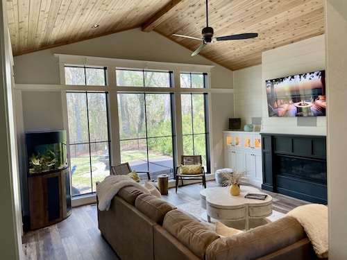 Custom 4-bedroom home, boat slip, fenced backyard, pool & paved bike path.