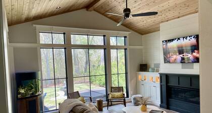 Custom 4-bedroom home, boat slip, fenced backyard, pool & paved bike path.