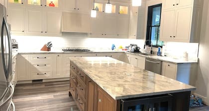 2 Night Minimum Stay! Custom 4-bedroom home w/boat slip & swimming pool.