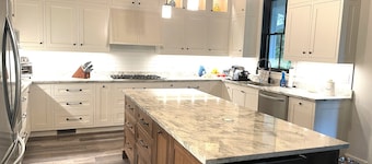 2 Night Minimum Stay! Custom 4-bedroom home w/boat slip & swimming pool.