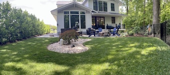 Custom 4-bedroom home, boat slip, fenced backyard, pool & paved bike path.