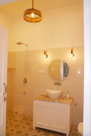 Shower, hair dryer, towels, soap