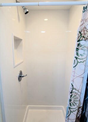 Shower, towels, soap, shampoo